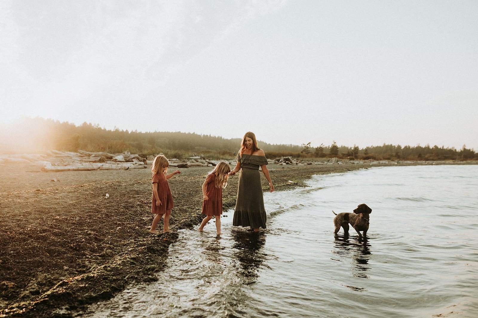 A mom and her daughters and there dog exploring the best picnic spots in Victoria, BC